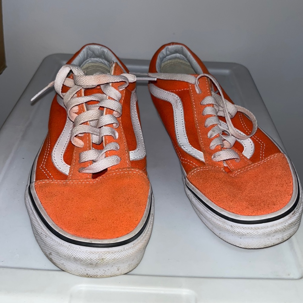 Orange and white Vans